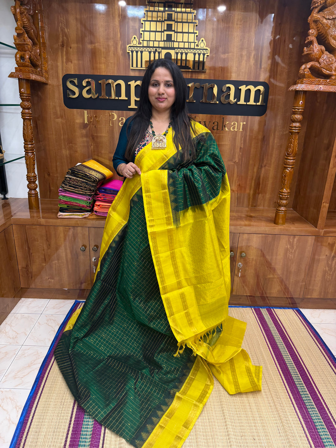 Dark Green with Lemon Yellow , Zari Checks with rich Butta in the body and rettapet  border , rich Pallu Korvai Silk Cotton Saree