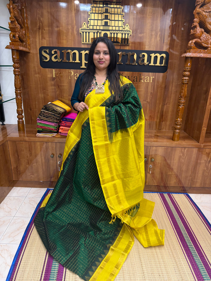 Dark Green with Lemon Yellow , Zari Checks with rich Butta in the body and rettapet  border , rich Pallu Korvai Silk Cotton Saree