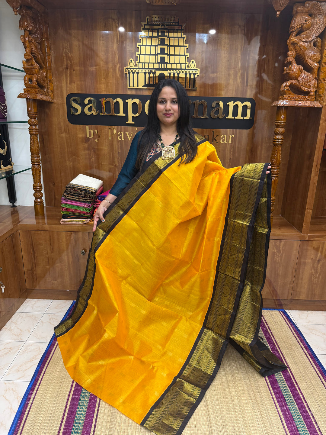 Mambazha Manjal with Brown , rich Lotus  Zari butta in the body and Traditional Borders , rich Pallu Korvai Silk Cotton Saree