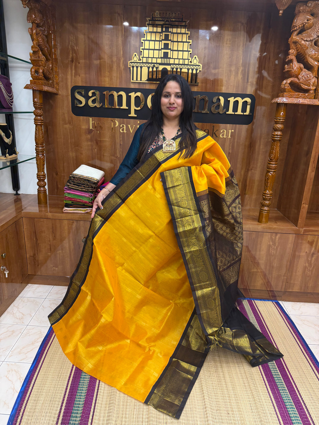 Mambazha Manjal with Brown , rich Lotus  Zari butta in the body and Traditional Borders , rich Pallu Korvai Silk Cotton Saree
