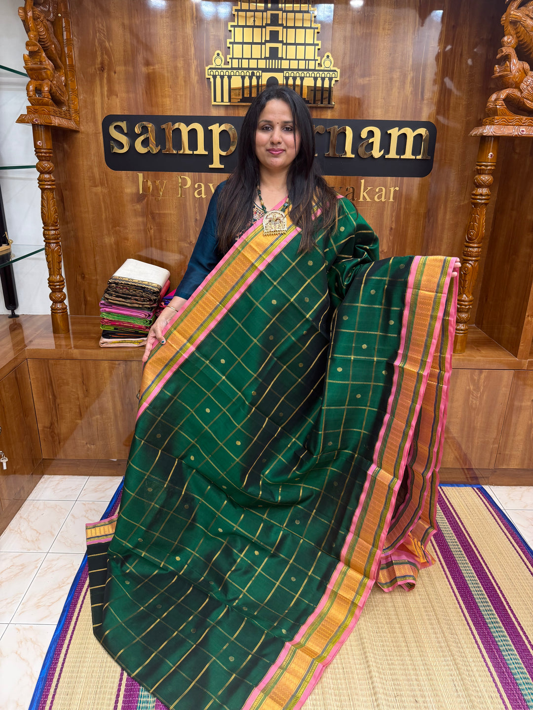 Green with Peach , Zari Checks with rich Butta in the body and Traditional  border , rich Pallu Korvai Silk Cotton Saree