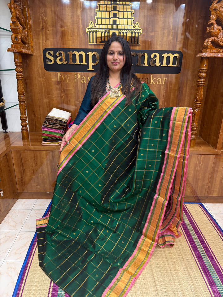Green with Peach , Zari Checks with rich Butta in the body and Traditional  border , rich Pallu Korvai Silk Cotton Saree