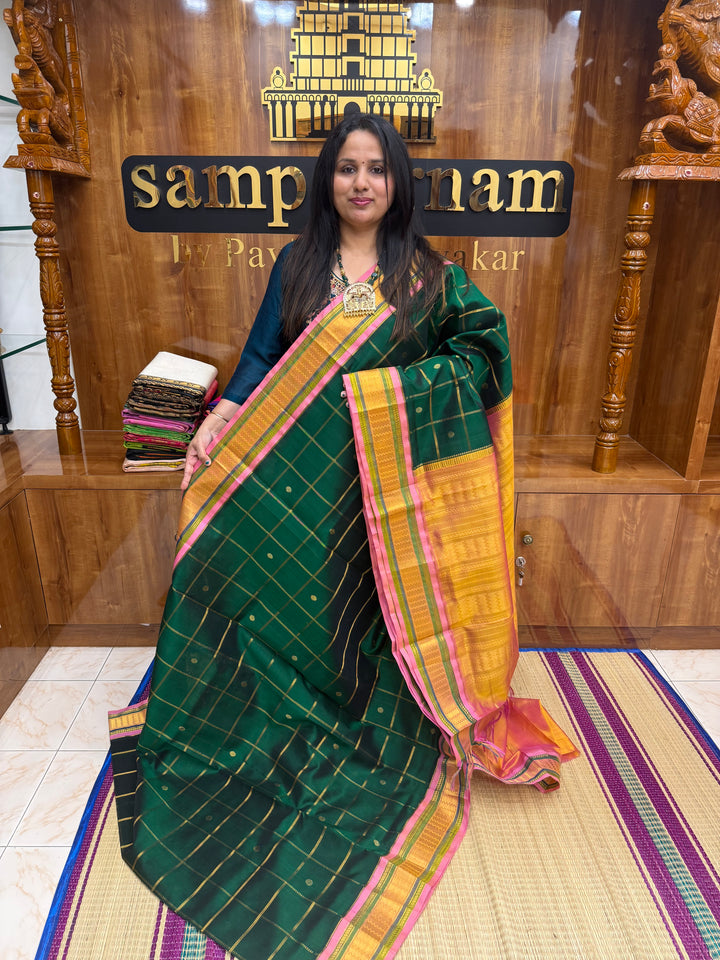 Green with Peach , Zari Checks with rich Butta in the body and Traditional  border , rich Pallu Korvai Silk Cotton Saree