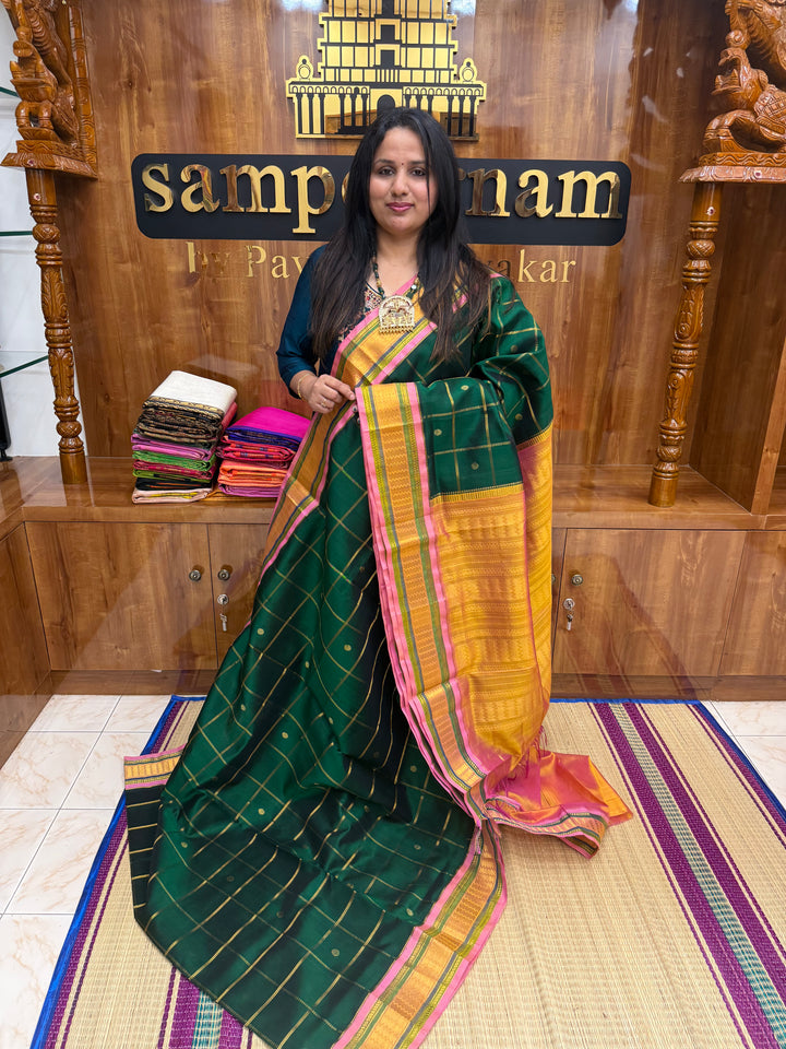 Green with Peach , Zari Checks with rich Butta in the body and Traditional  border , rich Pallu Korvai Silk Cotton Saree