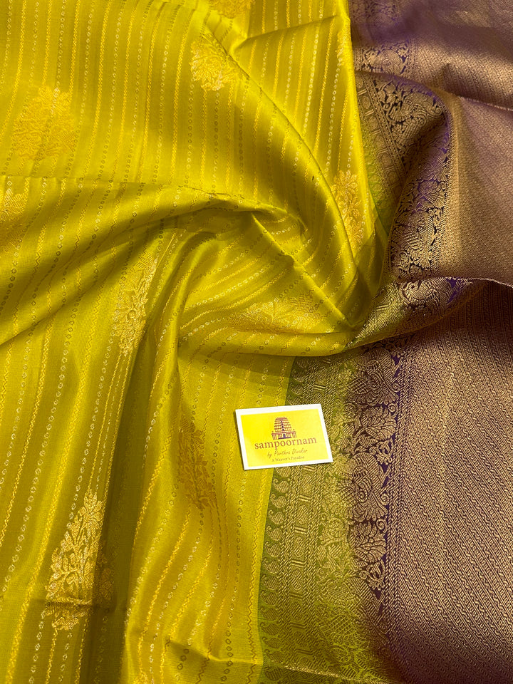 Lemon Yellow with Purple Rich Body with Silver and Gold Zari Lines and Rich Zari Butta with A Grand Pallu Pure Soft Silk Saree