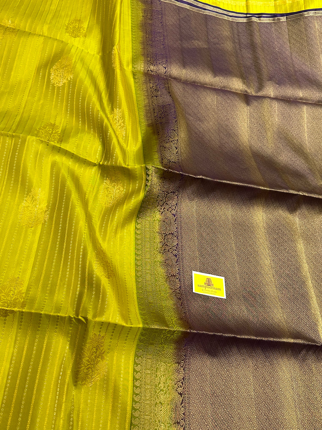 Lemon Yellow with Purple Rich Body with Silver and Gold Zari Lines and Rich Zari Butta with A Grand Pallu Pure Soft Silk Saree