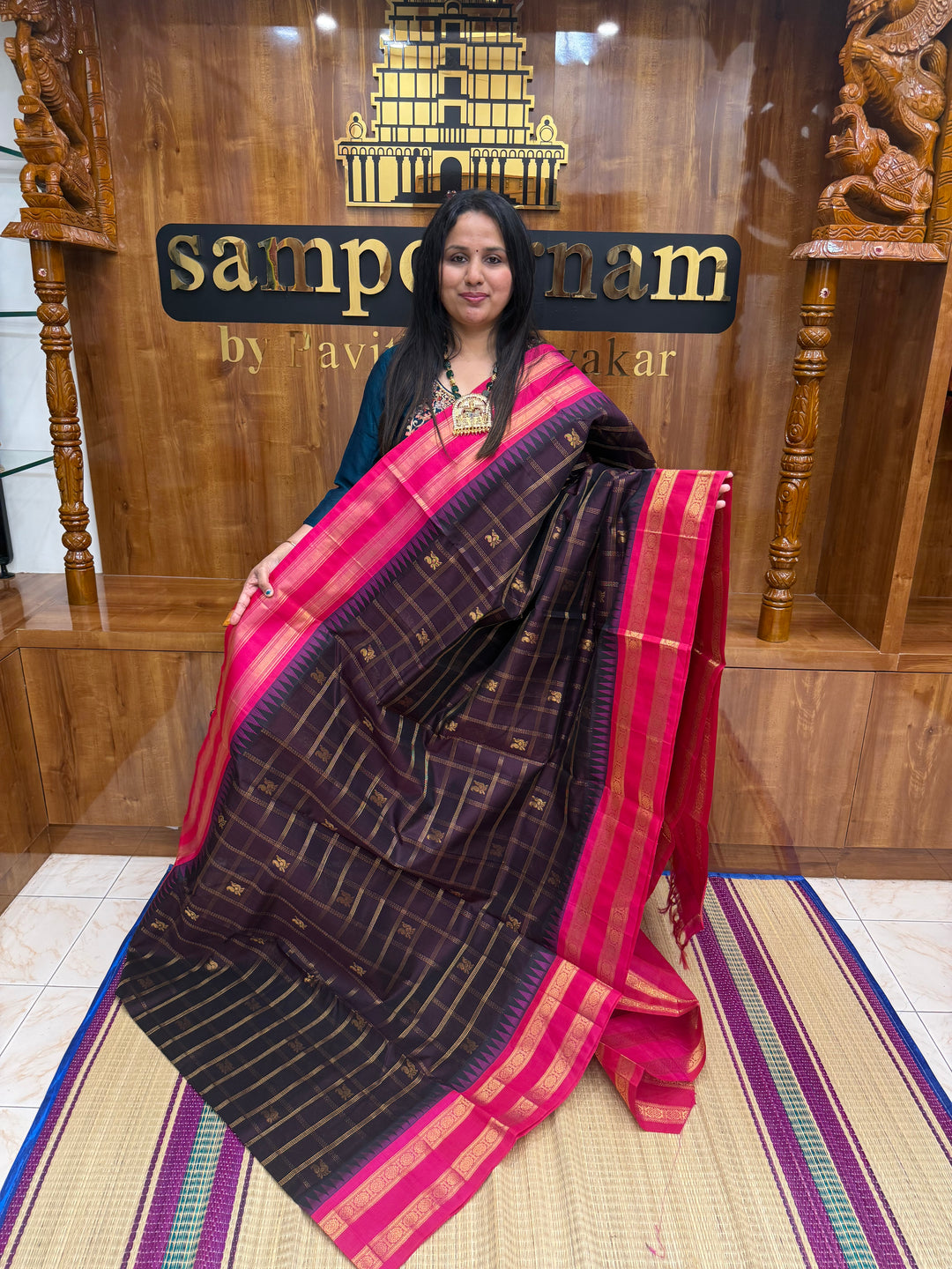 Brown with Magenta , Zari Checks with Mayil and Chakram rich Butta  in the body and rettapet border , rich Pallu Korvai Silk Cotton Saree
