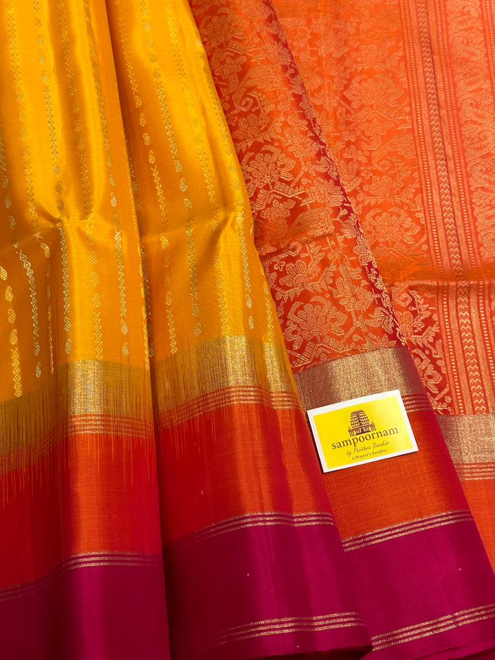 Yellow with Orange Triple Border , Rich Zari In the Body and Rich Pallu Pure Soft Silk Saree