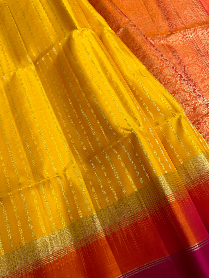 Yellow with Orange Triple Border , Rich Zari In the Body and Rich Pallu Pure Soft Silk Saree