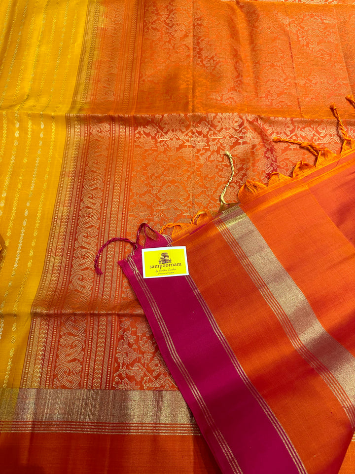 Yellow with Orange Triple Border , Rich Zari In the Body and Rich Pallu Pure Soft Silk Saree