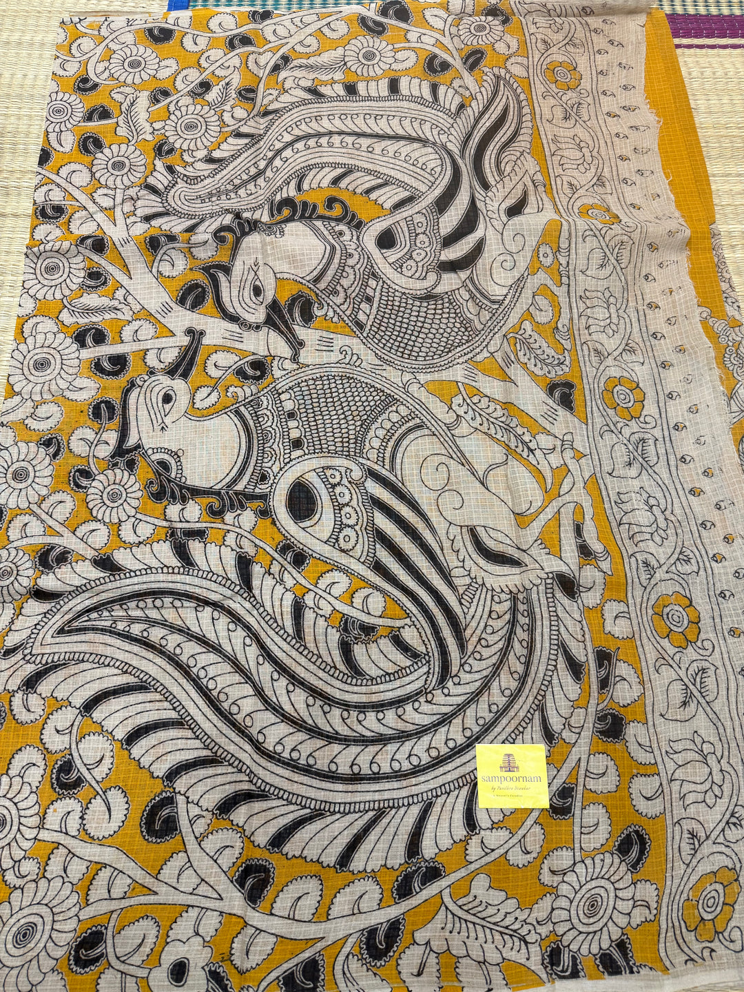 Yellow  Kalamkari Prints in the body and Pallu Pure Kota Cotton Saree