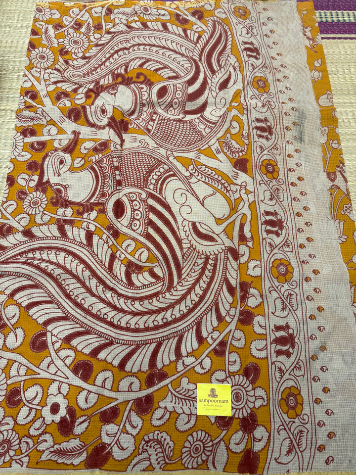 Light Orange  Kalamkari Prints in the body and Pallu Pure Kota Cotton Saree