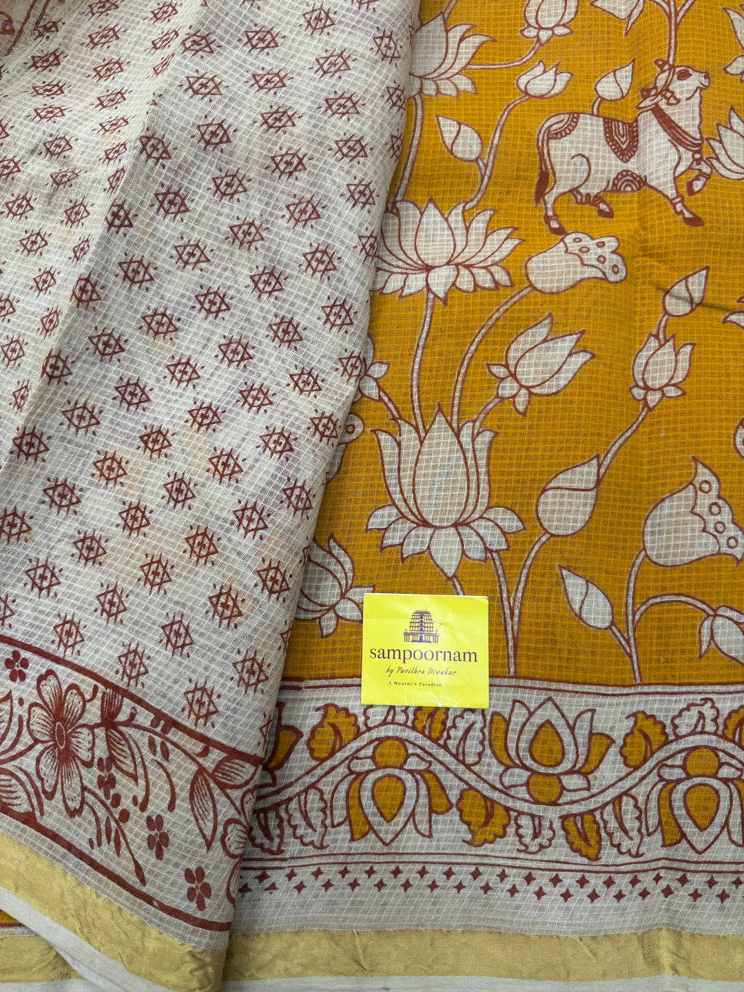Light Orange  Kalamkari Prints in the body and Pallu Pure Kota Cotton Saree