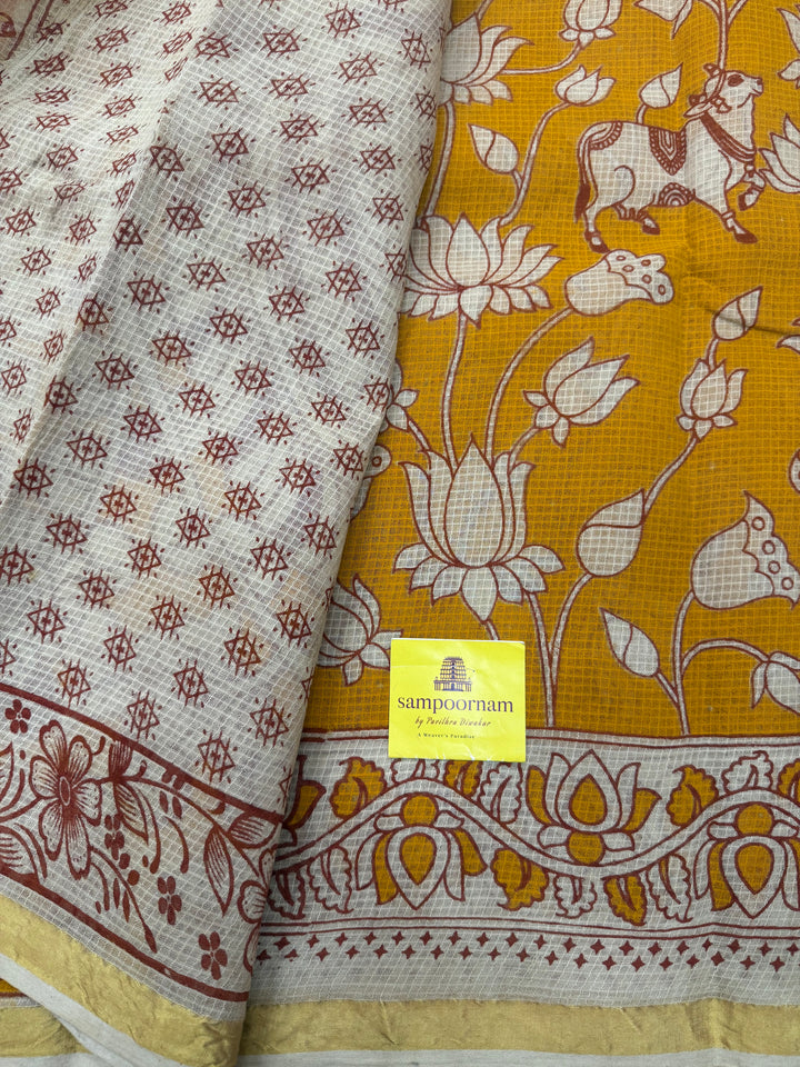 Light Orange  Kalamkari Prints in the body and Pallu Pure Kota Cotton Saree