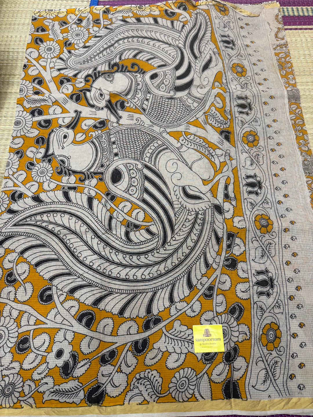 Yellow Kalamkari Prints in the body and Pallu Pure Kota Cotton Saree