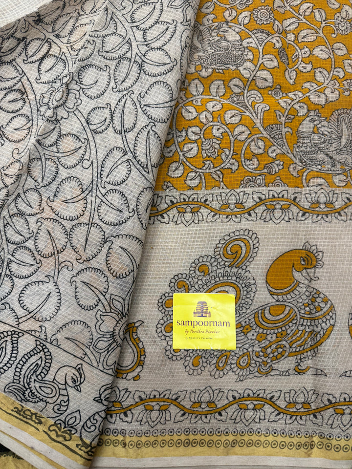 Yellow Kalamkari Prints in the body and Pallu Pure Kota Cotton Saree
