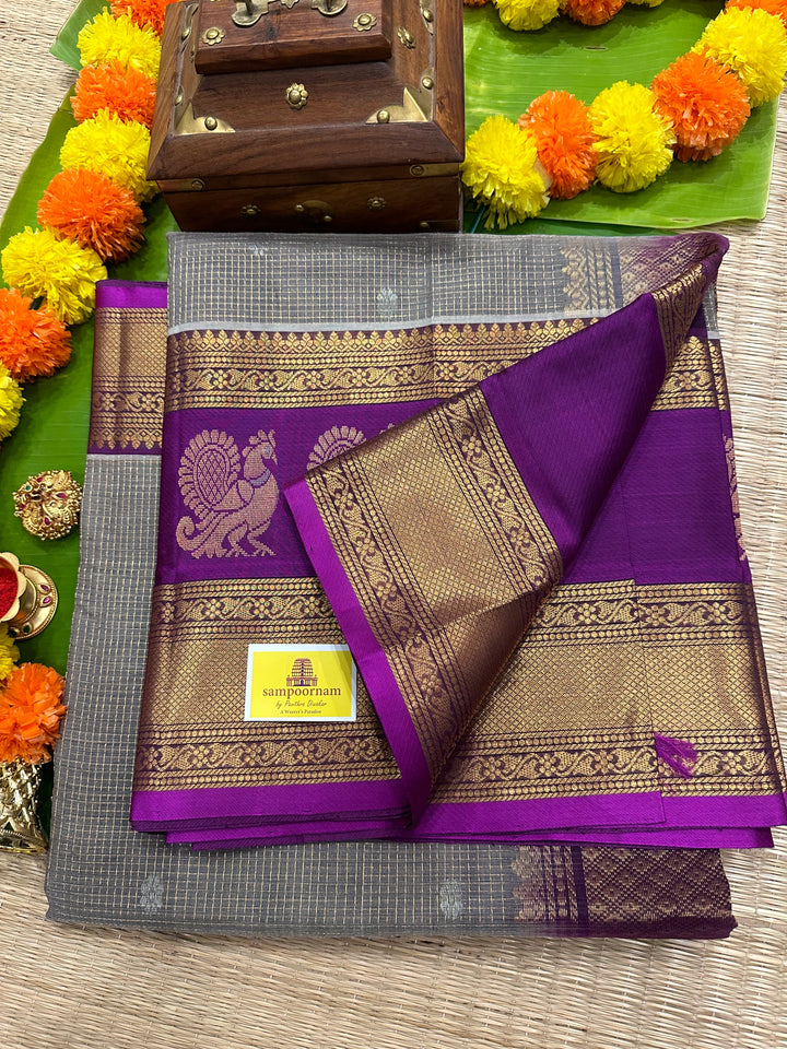 Grey with Purple Podi Kattam with Silver Butta in The Body and Satin Peacock Motif Border and Rich Pallu Korvai Silk Cotton Saree