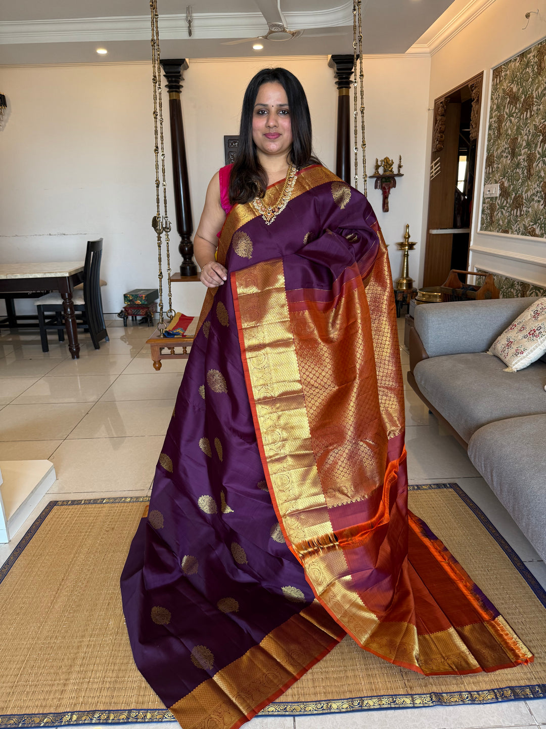 A Classic Navalpazham Jamun with Rust Orange Colour Saree with Rich Floral Zari Motif in the Body and Traditional Rich Border and Pallu Pure Kanjivaram Silk Saree