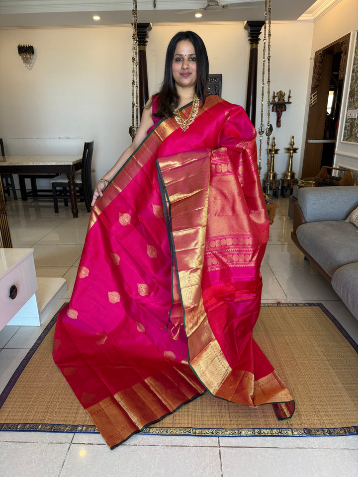 A Reddish Pink One Side Long Border Saree, with Rich Floral Zari motif in the Body, Traditional Border and Rich Pallu, Pure Kanjivaram Silk Saree