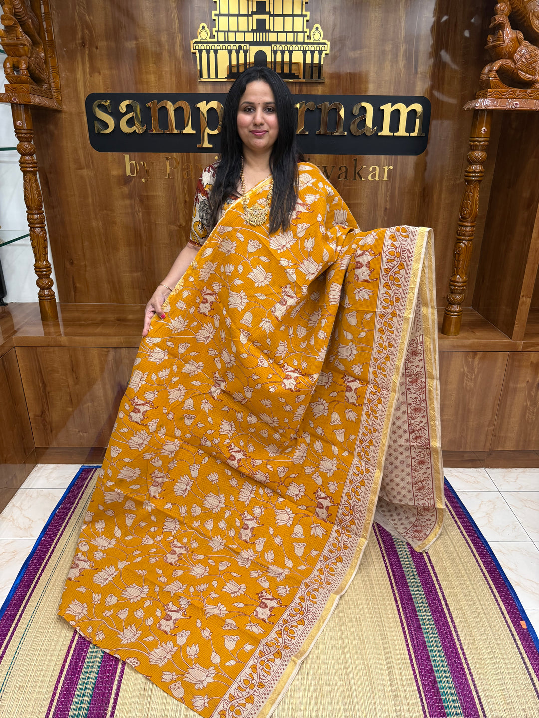 Light Orange  Kalamkari Prints in the body and Pallu Pure Kota Cotton Saree