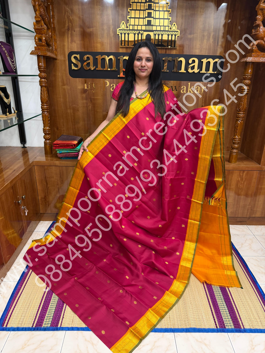 Kumkum Red with Mustard , Rich Mayil and Chakram  butta in the body , Traditional borders and Rich Pallu , Pure Kanjivaram Silk Saree