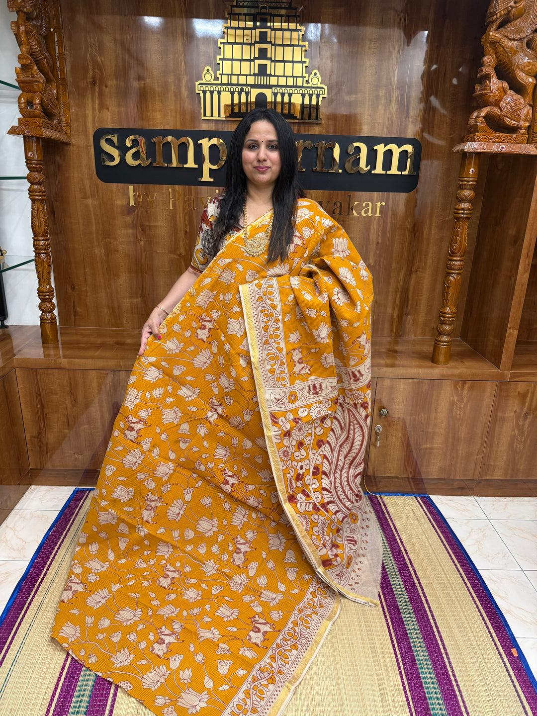 Light Orange  Kalamkari Prints in the body and Pallu Pure Kota Cotton Saree