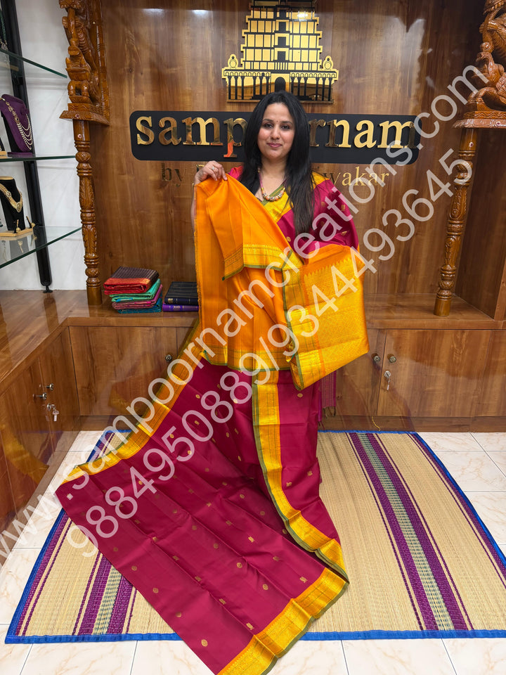 Kumkum Red with Mustard , Rich Mayil and Chakram  butta in the body , Traditional borders and Rich Pallu , Pure Kanjivaram Silk Saree