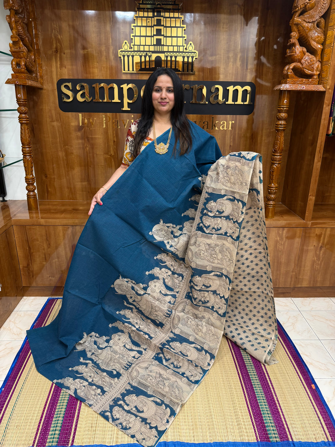 Teel Blue  Kalamkari Prints in the body and Pallu Pure Kota Cotton Saree