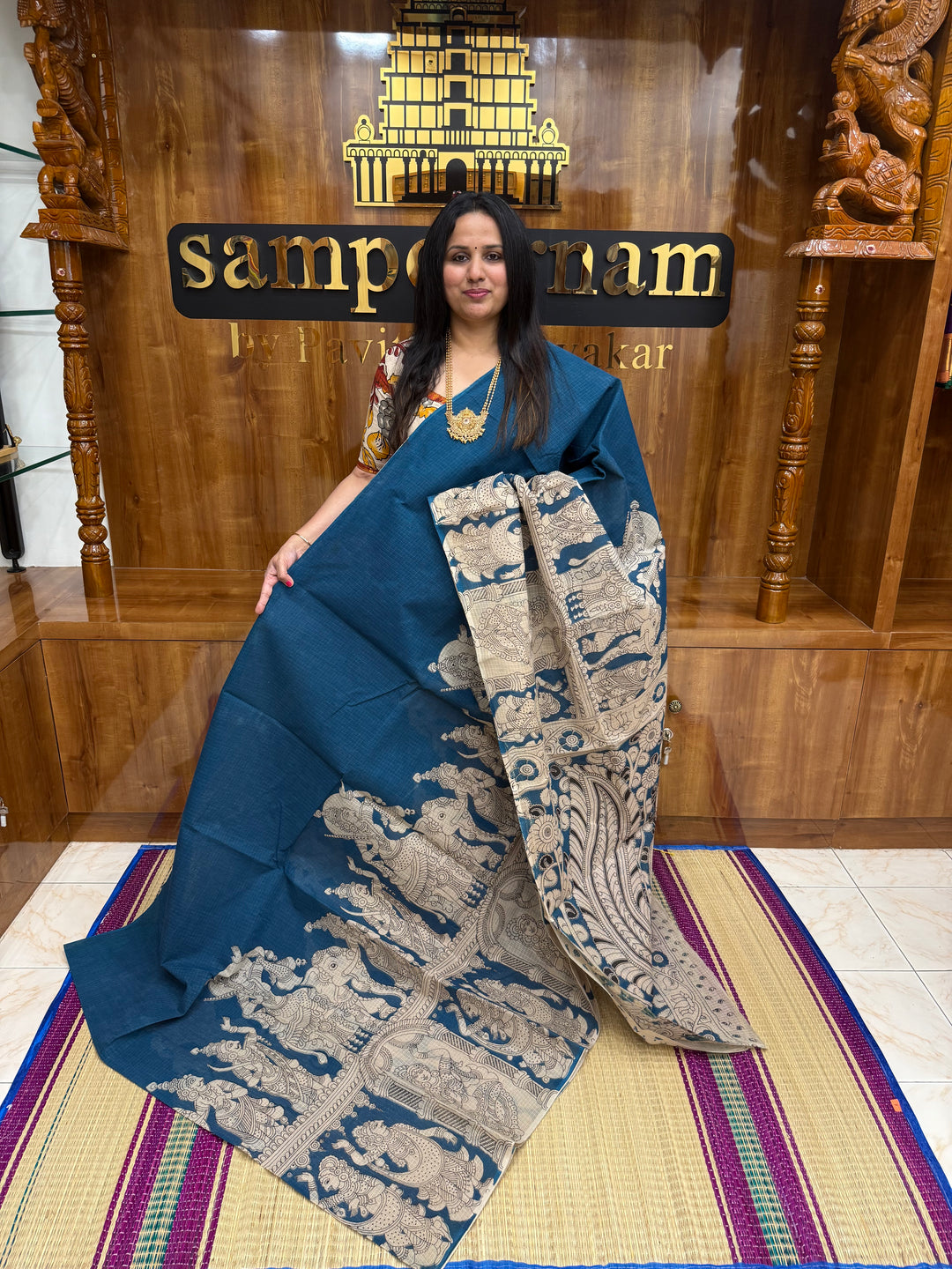 Teel Blue  Kalamkari Prints in the body and Pallu Pure Kota Cotton Saree