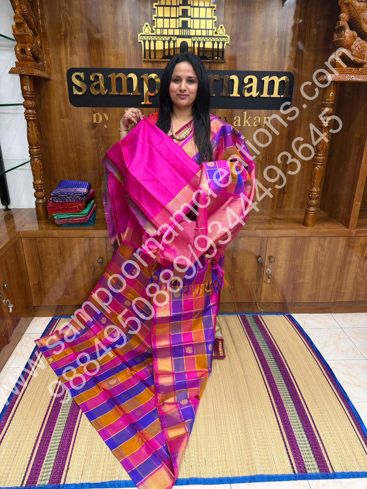 Pink , Purple , Mustard , Orange with Pink , Rich Mayil and Chakram  butta in the body with Zari checks , Traditional borders and Rich Pallu , Pure Kanjivaram Silk Saree