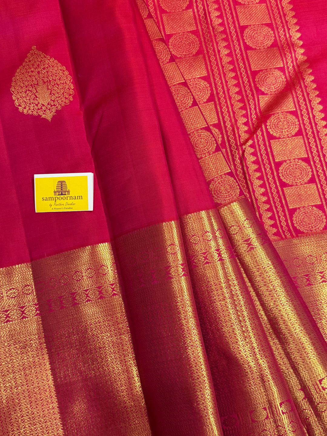 A Reddish Pink One Side Long Border Saree, with Rich Floral Zari motif in the Body, Traditional Border and Rich Pallu, Pure Kanjivaram Silk Saree