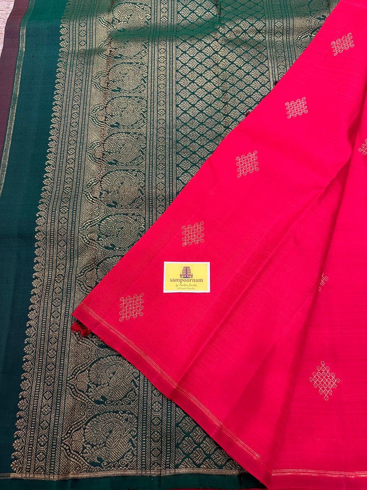 A Beautiful Red with Dark Green , Kolam Zari Motif in the Body and Rich Grand Pallu Pure Kanjivaram Silk Saree