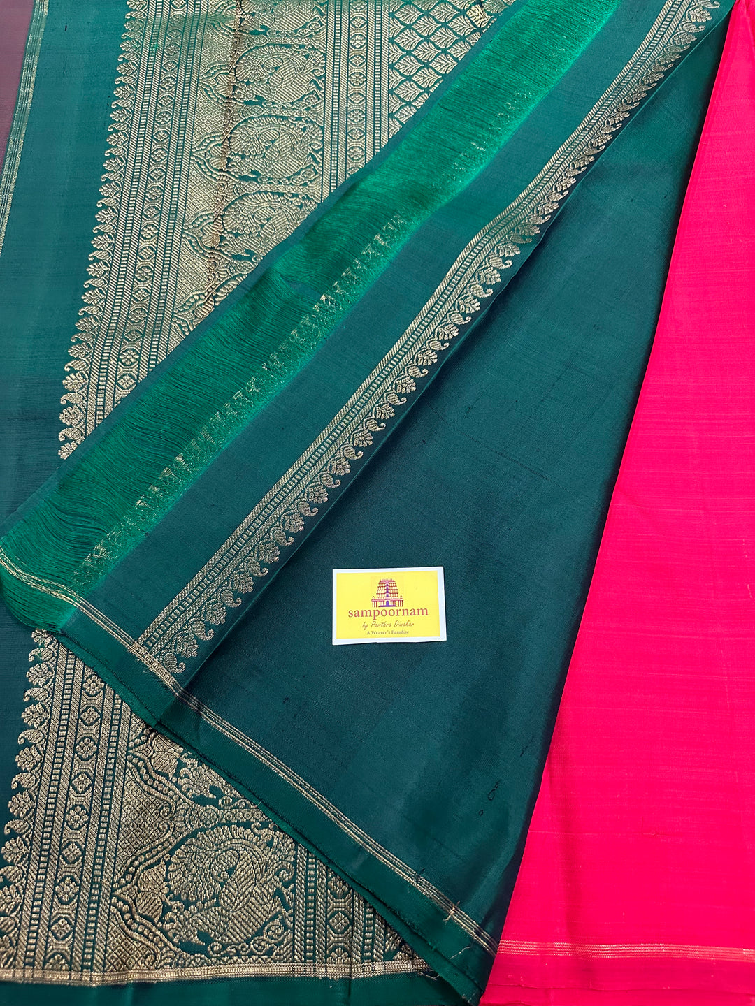 A Beautiful Red with Dark Green , Kolam Zari Motif in the Body and Rich Grand Pallu Pure Kanjivaram Silk Saree