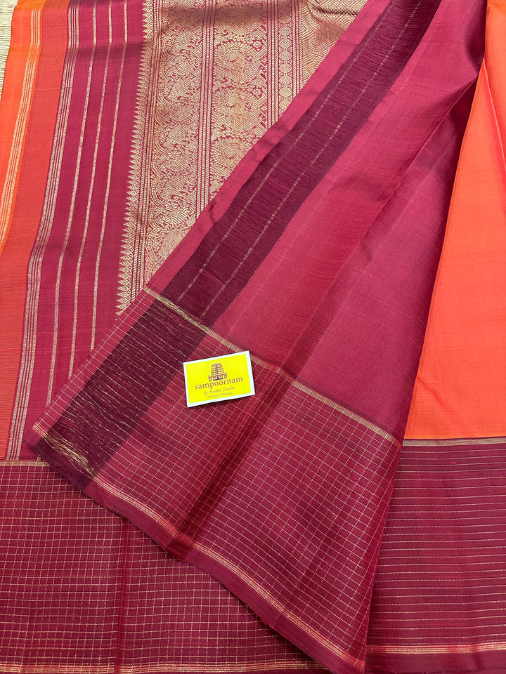 A Traditional Dark orange with Araku , Zari Checks Border , Mayil Chakram Zari Butta in Body and Traditional Rich Pallu Pure Kanjivaram Silk Saree