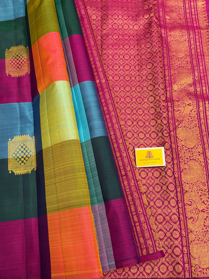 A Vintage with a twist, A Borderless Pallum Pazham Kattam Saree, in Shades Of Blue, Purple, Green, Pink and Orange with Zari Butta in the Body, Rich Traditional Pallu, Pure Kanjivaram Silk Saree
