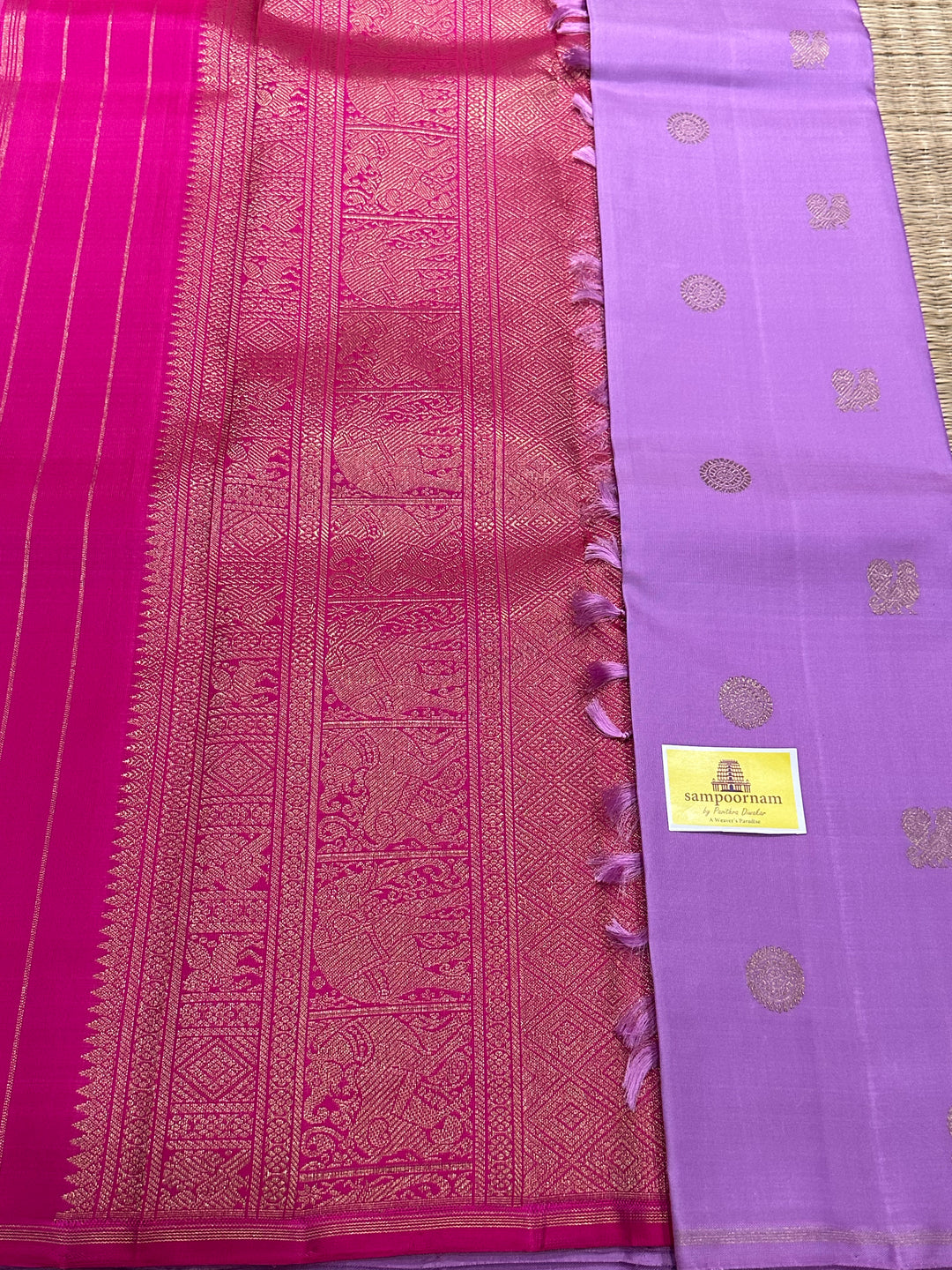 A Lovely Lavender and Pink Saree with Rich Mayil and Chakram Motif WIth Rich Pallu Pure Kanjivaram Silk Saree