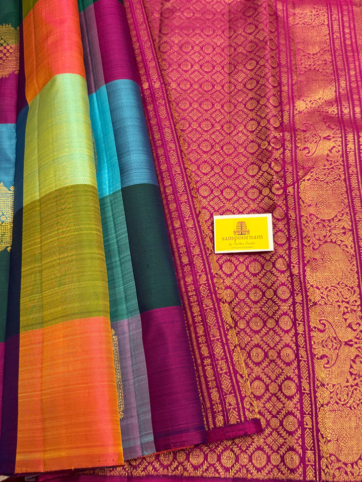 A Vintage with a twist, A Borderless Pallum Pazham Kattam Saree, in Shades Of Blue, Purple, Green, Pink and Orange with Zari Butta in the Body, Rich Traditional Pallu, Pure Kanjivaram Silk Saree