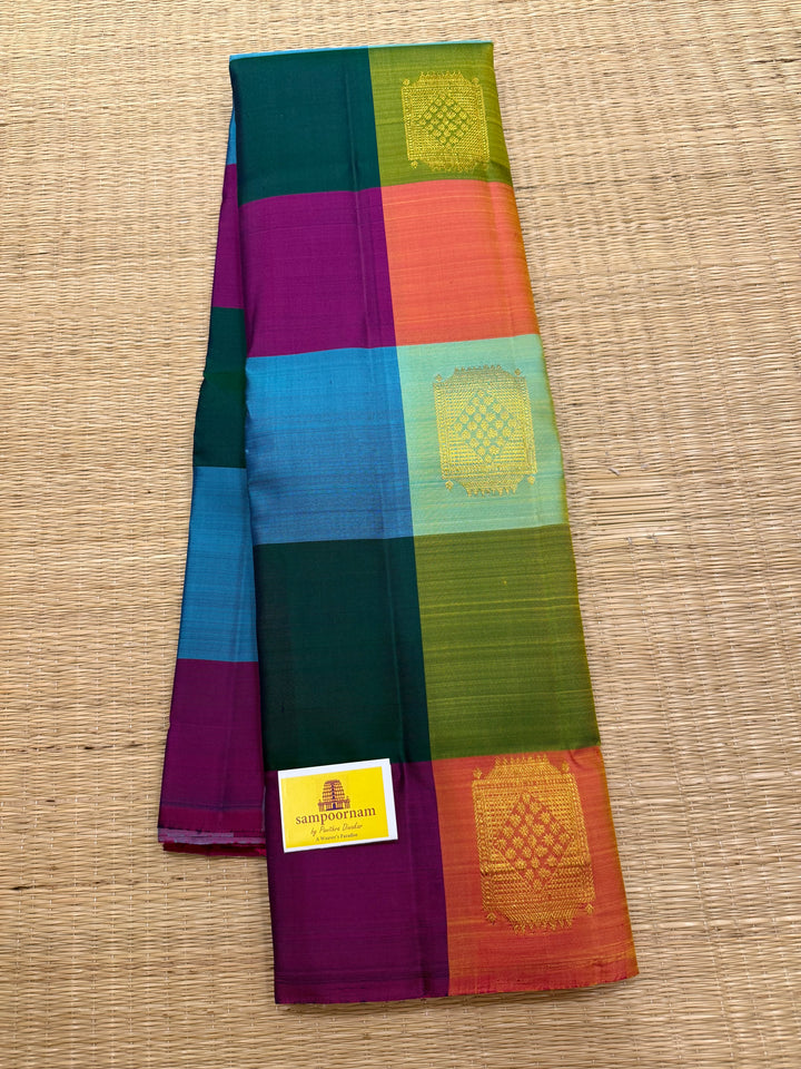 A Vintage with a twist, A Borderless Pallum Pazham Kattam Saree, in Shades Of Blue, Purple, Green, Pink and Orange with Zari Butta in the Body, Rich Traditional Pallu, Pure Kanjivaram Silk Saree
