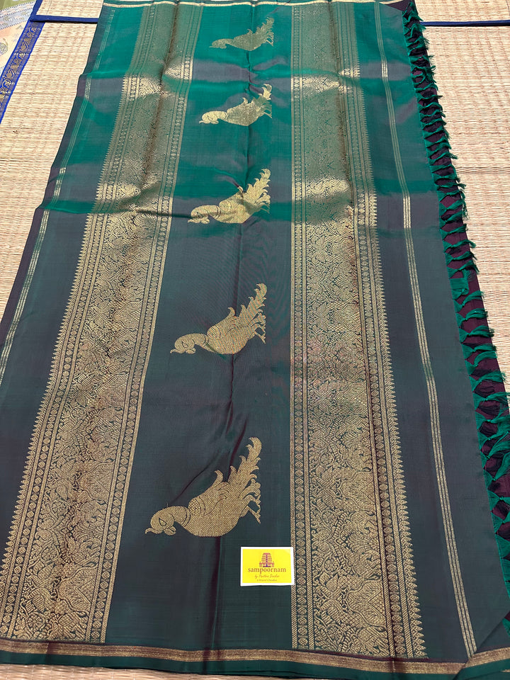 A Classic Dark Araku with Dark Manthulir Green Saree, with Small Mayil and Chakram Zari Motif and Richi Kili Kanjivaram Pallu Pure Kanjivaram Silk Saree