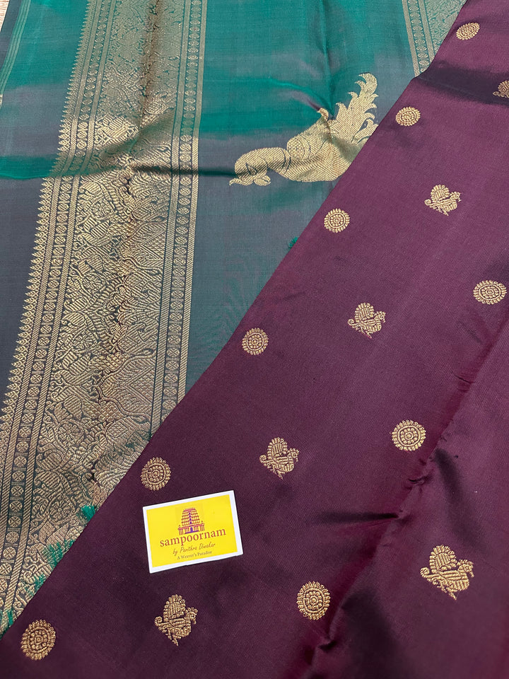 A Classic Dark Araku with Dark Manthulir Green Saree, with Small Mayil and Chakram Zari Motif and Richi Kili Kanjivaram Pallu Pure Kanjivaram Silk Saree