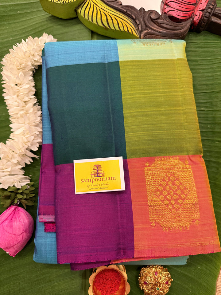A Vintage with a twist, A Borderless Pallum Pazham Kattam Saree, in Shades Of Blue, Purple, Green, Pink and Orange with Zari Butta in the Body, Rich Traditional Pallu, Pure Kanjivaram Silk Saree