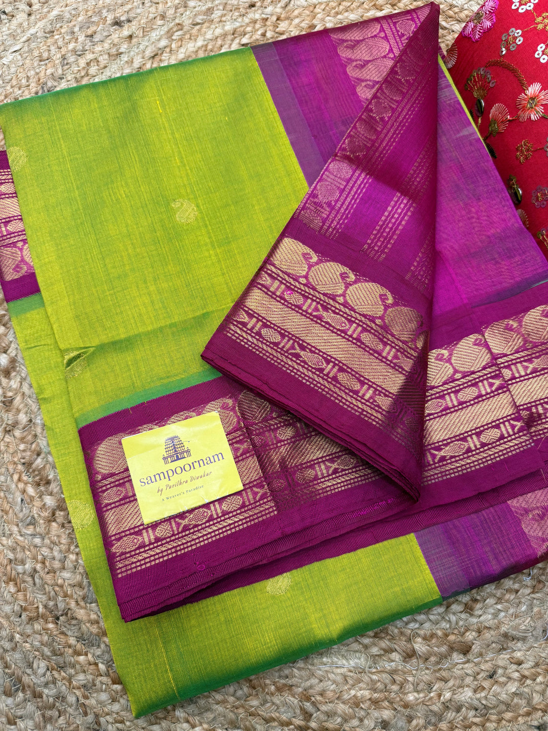 Parrot Green with Pink , rich Mango Zari Butta in the body , traditional borders and rich Pallu Korvai Silk Cotton Saree