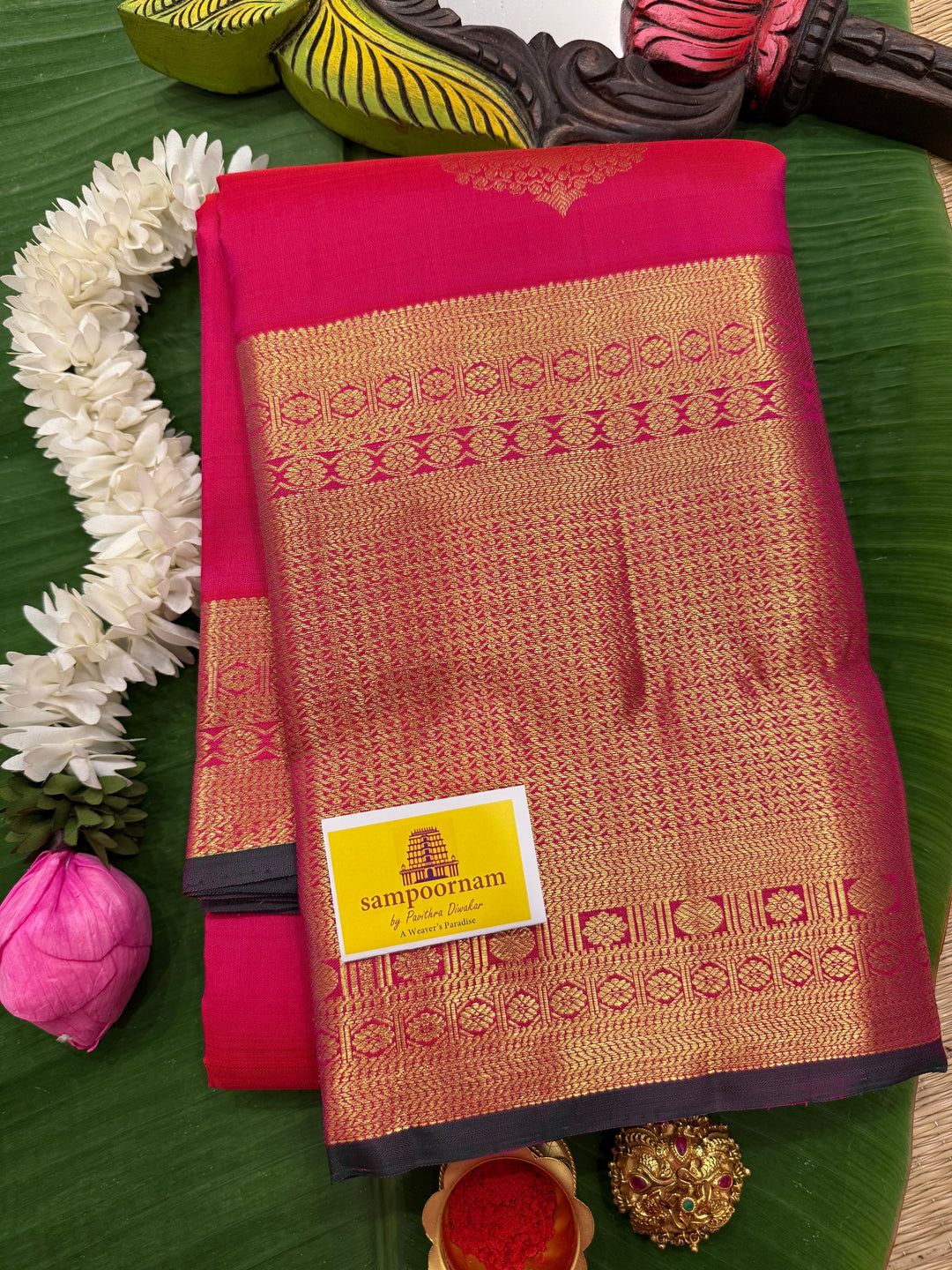 A Reddish Pink One Side Long Border Saree, with Rich Floral Zari motif in the Body, Traditional Border and Rich Pallu, Pure Kanjivaram Silk Saree