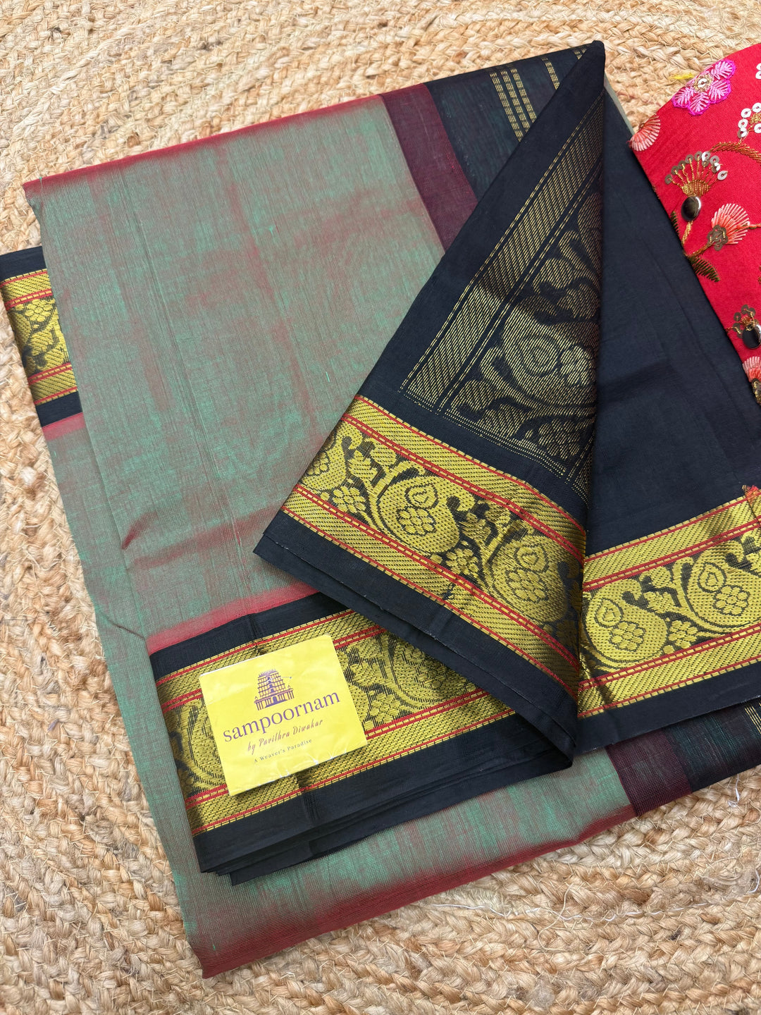 Manthulir Green  with Black , Traditional borders and Rich Pallu Korvai Silk Cotton Saree