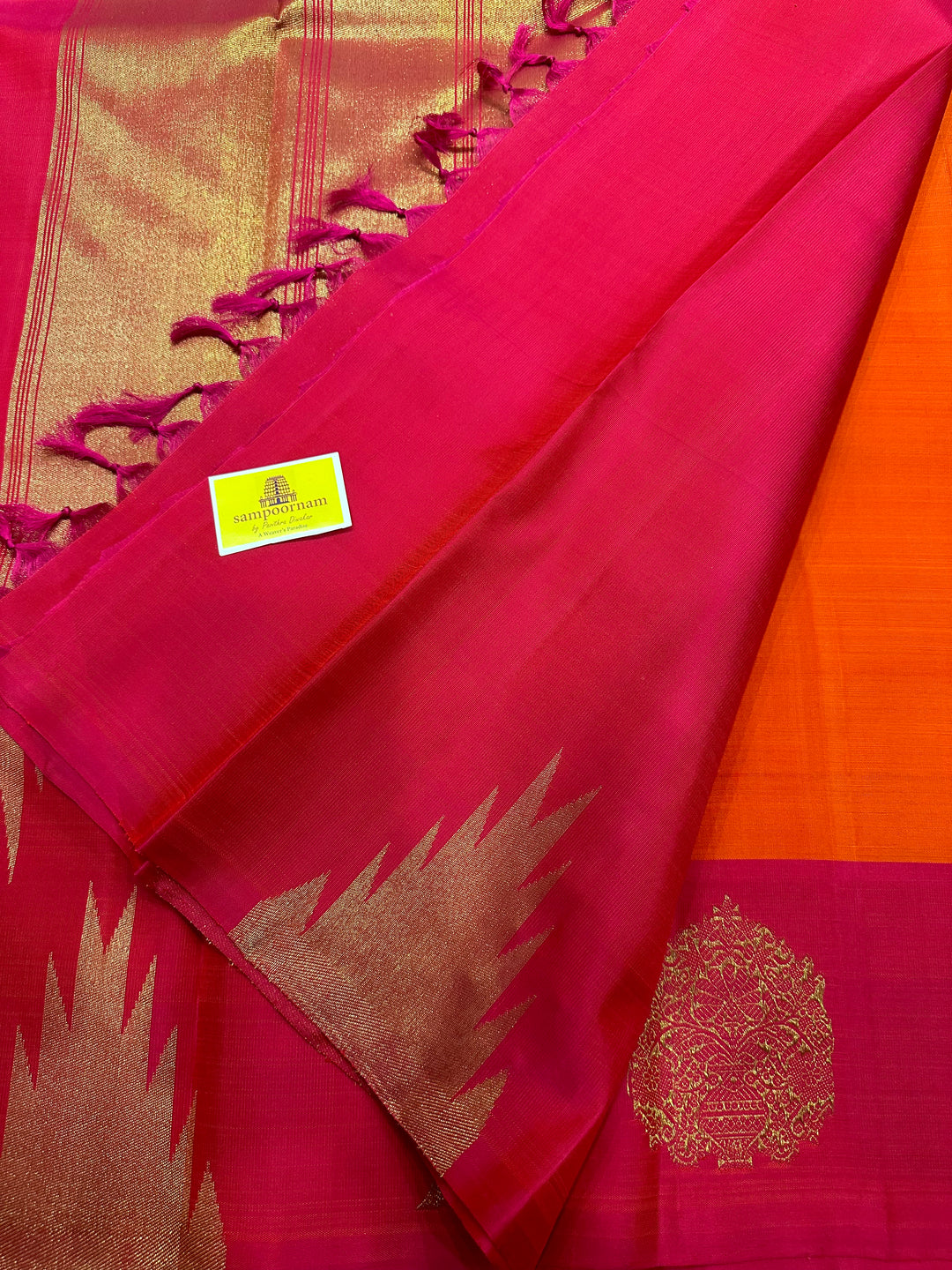 A Beautiful Orange with Dark pink with Traditional Temple, Gomatha and Kodi Zari Motif in Border and Rich pallu , Pure Kanjivaram Silk Saree