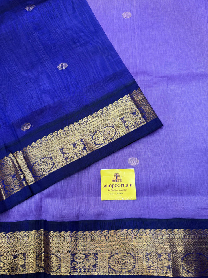 Lavender with Dark Blue , rich  Zari Butta in the body , traditional borders and rich Pallu Korvai Silk Cotton Saree