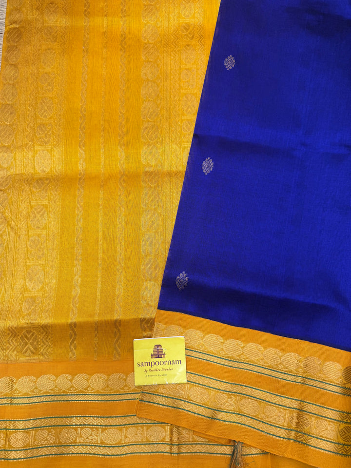 Royal Blue with Manjal , rich  Zari Butta in the body , Rettapet borders and rich Pallu Korvai Silk Cotton Saree