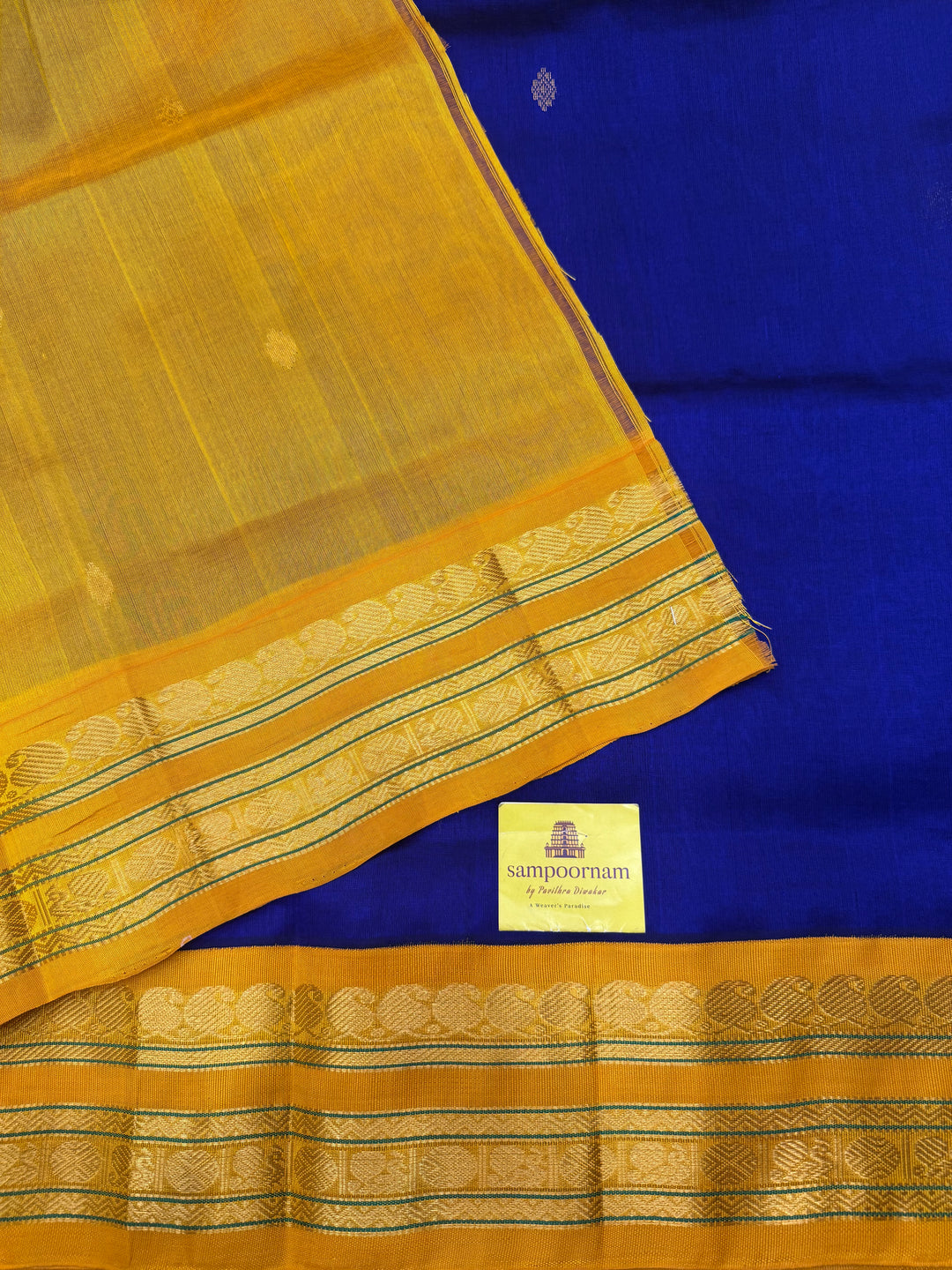 Royal Blue with Manjal , rich  Zari Butta in the body , Rettapet borders and rich Pallu Korvai Silk Cotton Saree