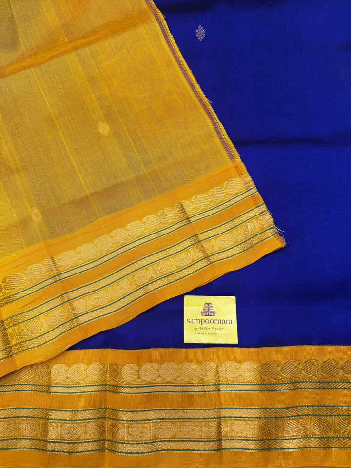 Royal Blue with Manjal , rich  Zari Butta in the body , Rettapet borders and rich Pallu Korvai Silk Cotton Saree