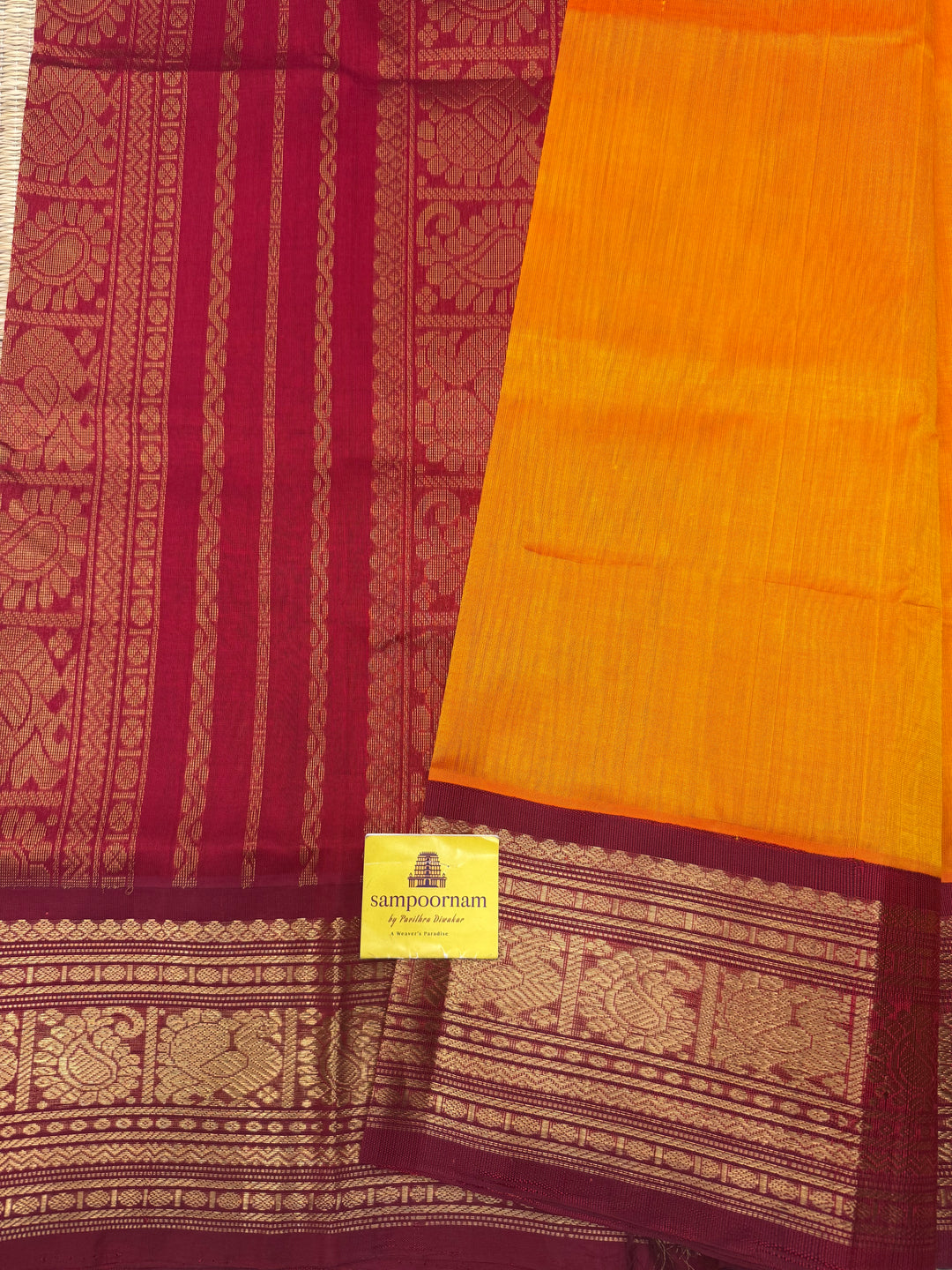 Mambazha Manjal with Kumkum Red  , Traditional Big Kanchi Borders and rich Pallu Korvai Silk Cotton Saree